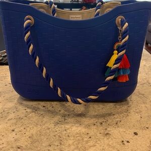 Blue Build A Bagg Rope bag with rainbow key chain.